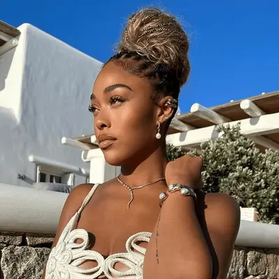 Jordyn Woods with a knotless braid bun