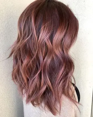 strawberry brown hair with waves