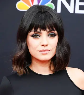 Mila Kunis with blunt mid length hair with fringe