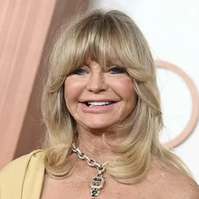 Goldie Hawn blonde hair curtain bangs