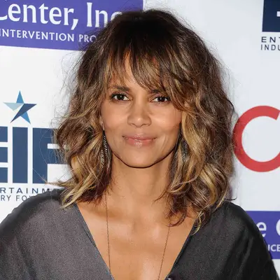 Halle Berry with wavy hair and loose bangs