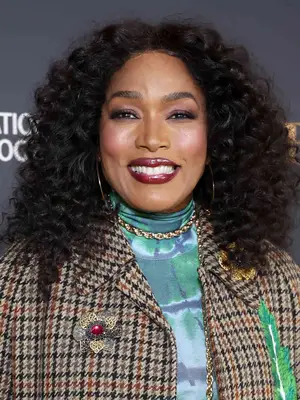 Angela Bassett with medium length spiral curls
