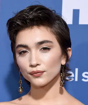 Rowan Blanchard wears a long, tousled pixie cut
