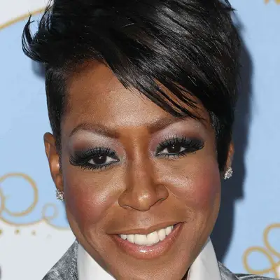 Tichina Arnold wears a choppy, asymmetrical pixie cut