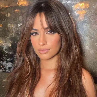 Brunette with wispy bangs