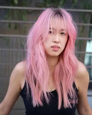 Daisy Edgar-Jones with long hair and curtain bangs