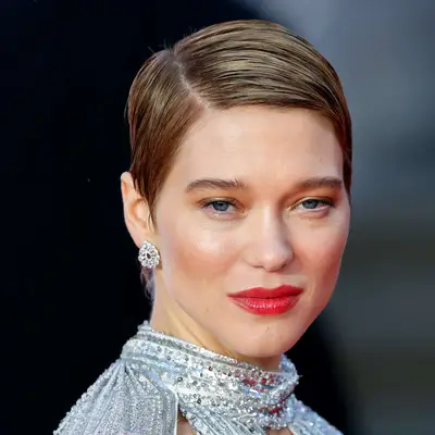 Lea Seydoux with a short, slicked-down hairstyle at the 2021 