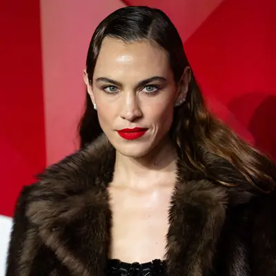 Alexa Chung with long slicked-back hair at the 2024 Fashion Awards in London, England