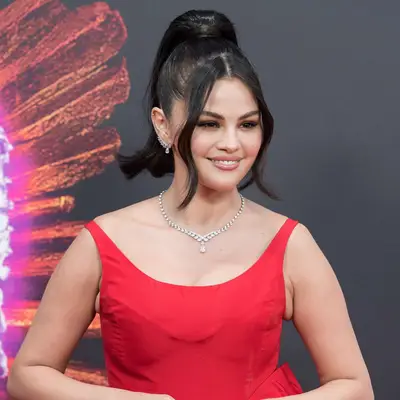 Selena Gomez with a slicked-back ponytail and face-framing pieces at the 2024 