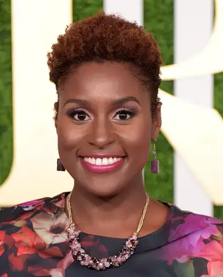 Issa Rae with natural curly pixie