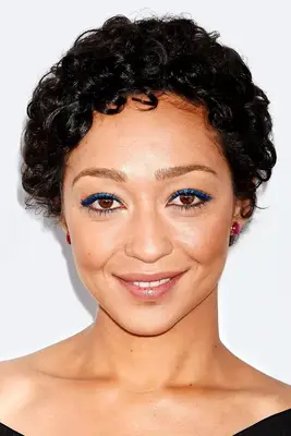 Ruth Negga with rounded curly pixie