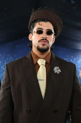 Bad Bunny wearing a suit and hat at the 2025 Met Gala