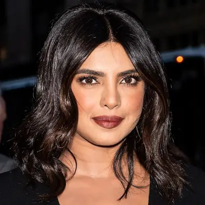 Priyanka Chopra Jonas wears a dark long bob hairstyle