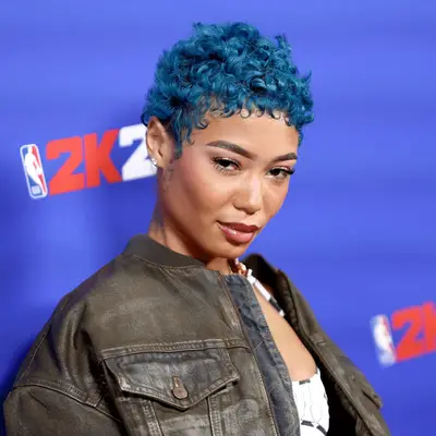 Tiffany Haddish wears a golden blonde buzzcut