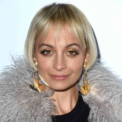 Nicole Richie with blonde French bob and wispy bangs