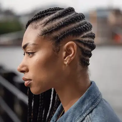 Side profile of a woman with braided hair