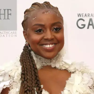 Quinta Brunson wears cornrowed feed-in braids with crystals