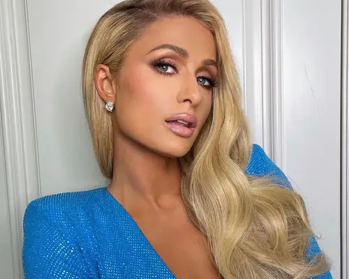 Paris Hilton wearing long hair extensions.