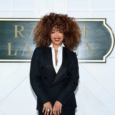 H.E.R with light brown, caramel and blonde highlights 