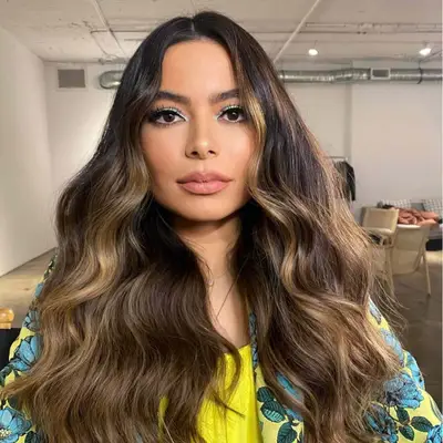 Miranda Cosgrove wearing brown hair with caramel colored balayage