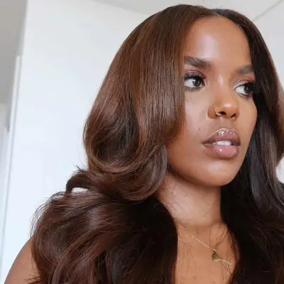 Person with auburn espresso hair color 