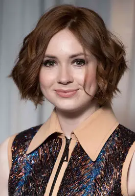 Karen Gillan with a Long Pixie Cut and auburn hair