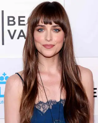 Dakota Johnson with burnt sienna auburn hair 