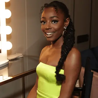 Venita Aspen wearing a low textured ponytail