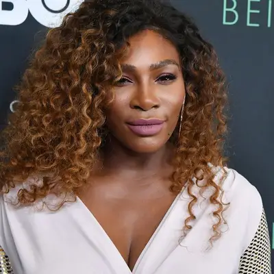 Serena Williams Routine: Serena Williams with curly hair on red carpet