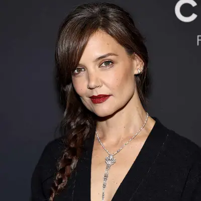 Katie Holmes attends Chanel dinner wearing chanel jewelry and side-swept braid