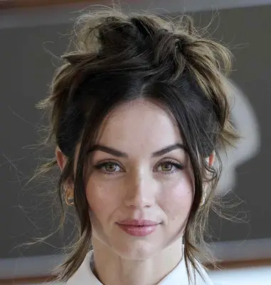 Ana de Armas with undone messy bun at the 