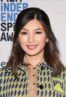 Gemma Chan with soft half-up, half-down style