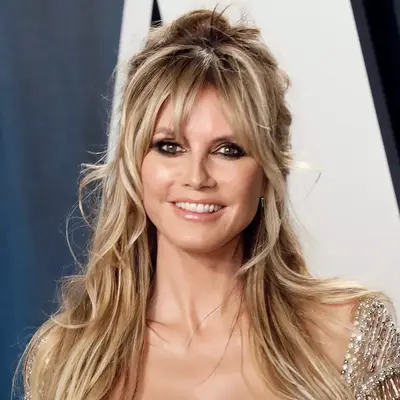 heidi klum posing with brigitte bardot french style hair at vanity fair oscar party 2020