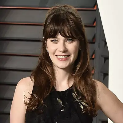 zooey deschanels with 1960s hairdo at vanity fair oscars party 2016