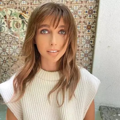 jennifer lopez with blonde curtain bangs