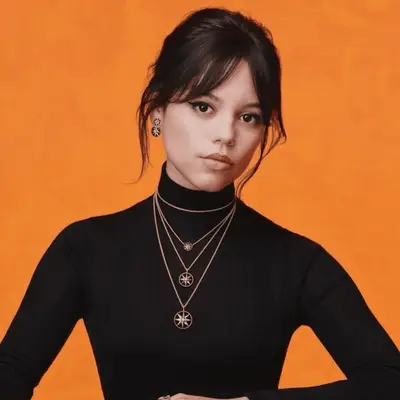 Bella Hadid with piecey bangs, gold hoops