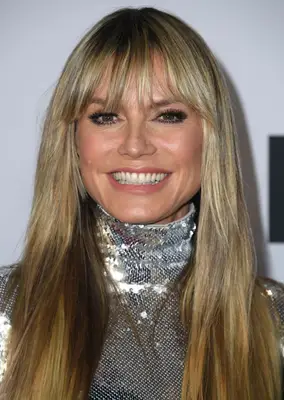 Heidi Klum long and straight wispy bangs with silver sequin turtleneck