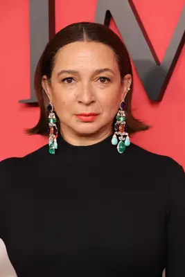Maya Rudolph wearing a middle-part bob with flipped ends