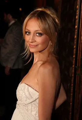 Nicole Richie wearing braided bun hairstyle