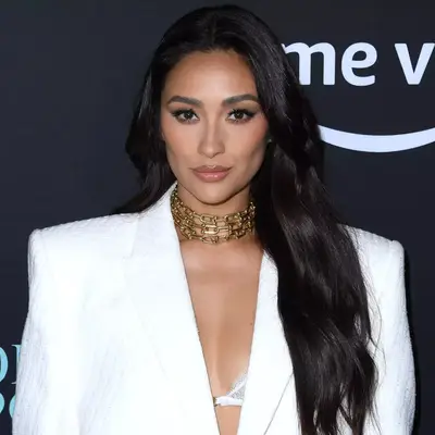 Shay Mitchell with long wavy hair 