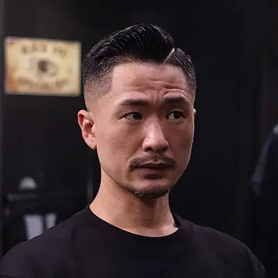 Man with gelled pompadour with faded sides