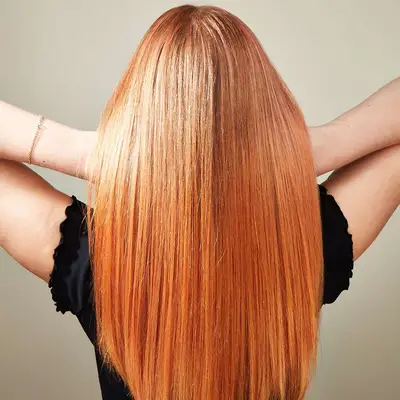 Woman with glass hair, viewed from the back