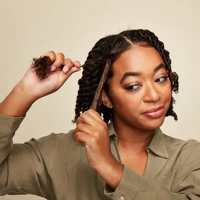 Model twists her hair