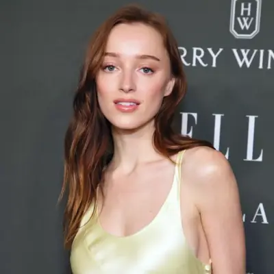 Phoebe Dynevor with light copper and cola-shaded hair.