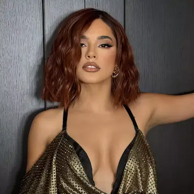 Shay Mitchell with cherry cola hair.