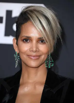 Halle Berry Poses at the 27th Annual Critics Choice Awards with asymmetric buzz cut and long blonde bangs