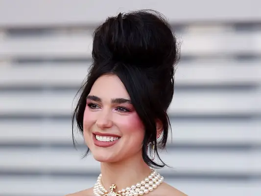 Dua Lipa wears a beehive hairstyle