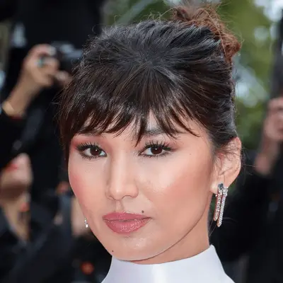 gemma chan wearing bangs and updo