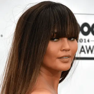 chrissy teigen wearing square bangs