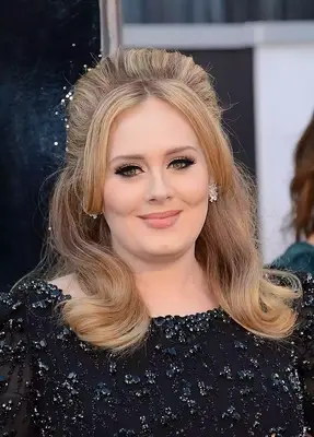 Adele with a raised bouffant